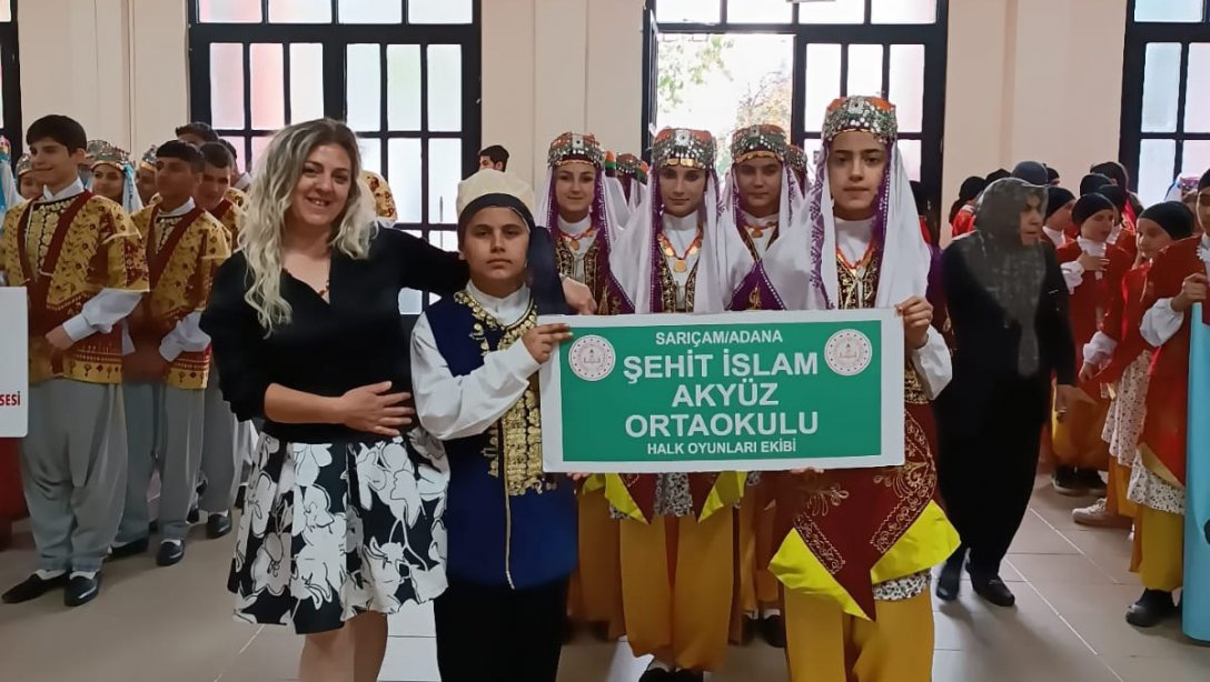 Geleneksel (Düzenlemesiz) Halk Oyunları Yarışmasında Adana 1.'incisi Olan İlçemiz Şehit İslam Akyüz Ortaokulu Öğrencilerimizi Ve Emeği Geçenleri Tebrik Ediyoruz.